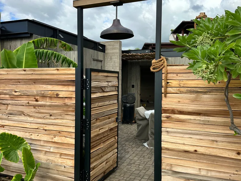 Custom metal gate with wood panels Maui