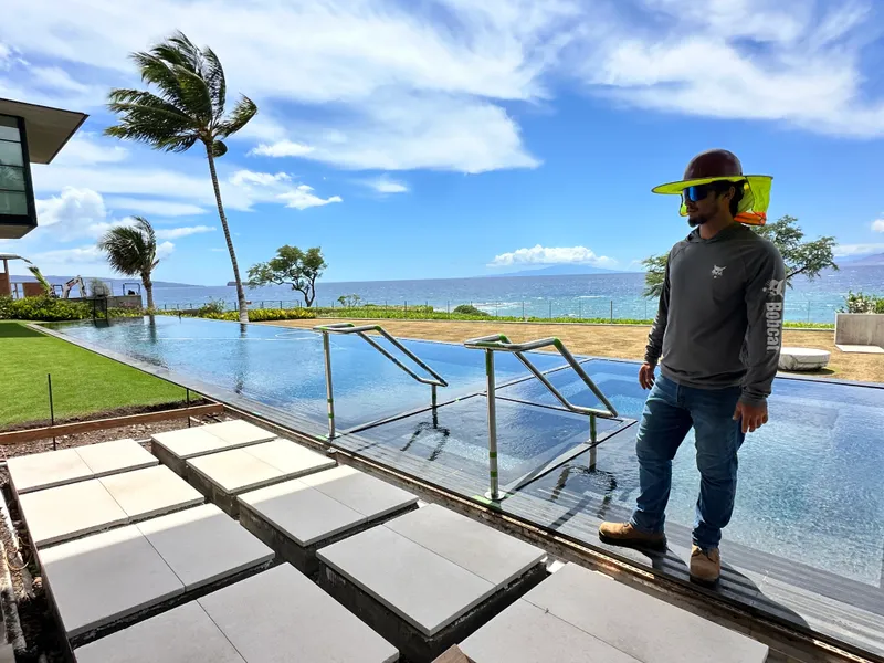 Pool railing installation Maui oceanfront property