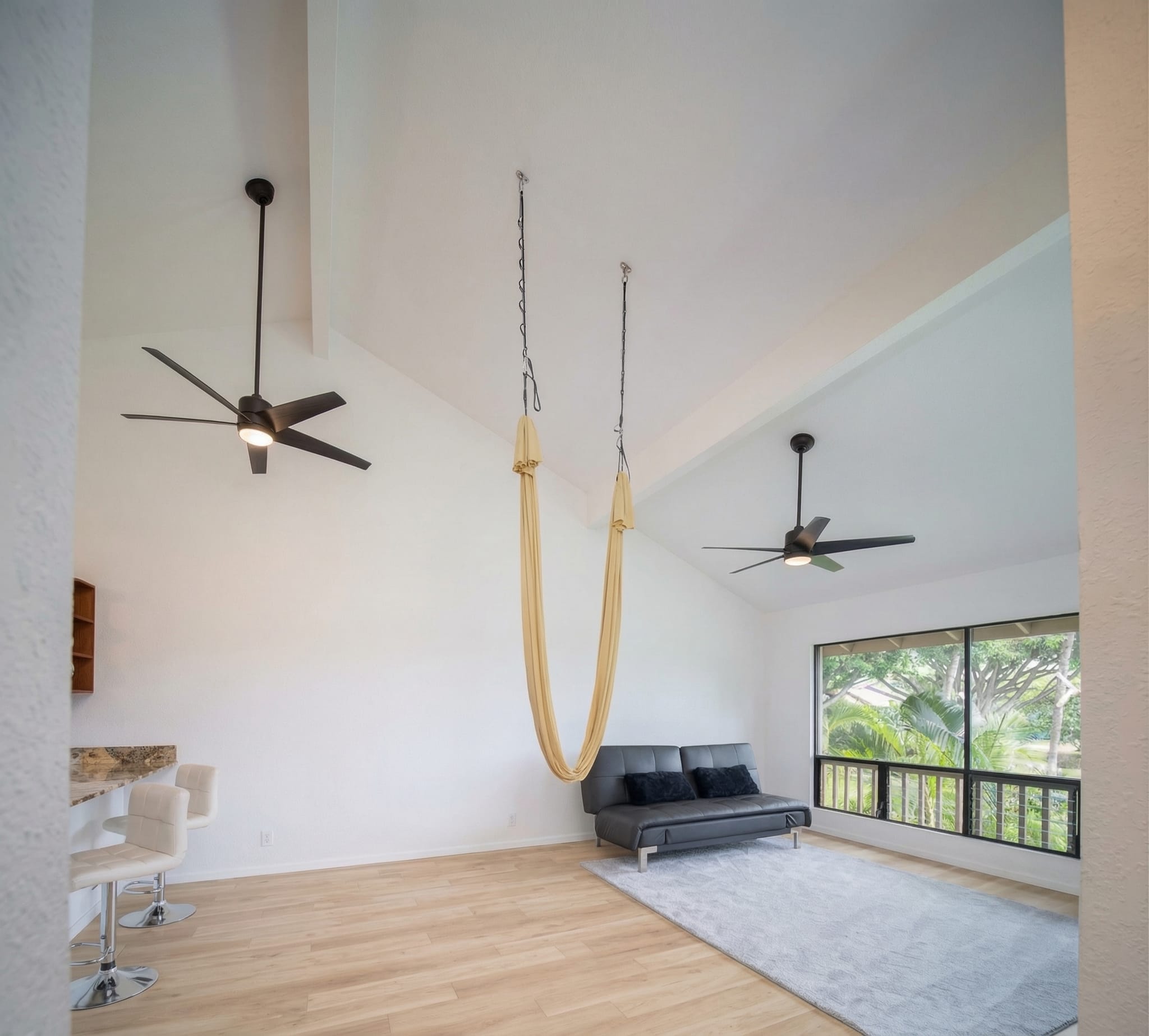 Living room remodel Maui — vaulted ceilings, LVP flooring and open indoor-outdoor flow