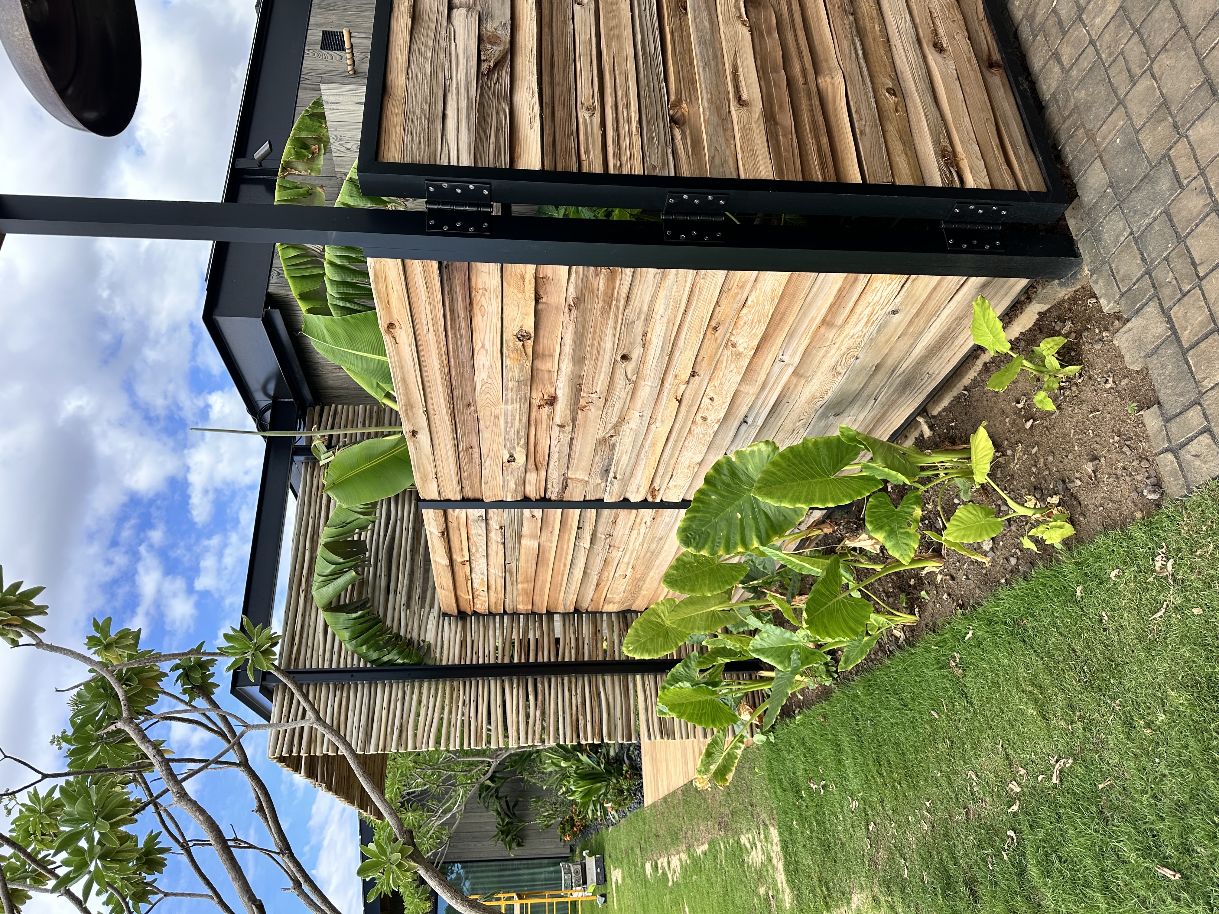 Custom metal and wood privacy fence Maui by Great General LLC