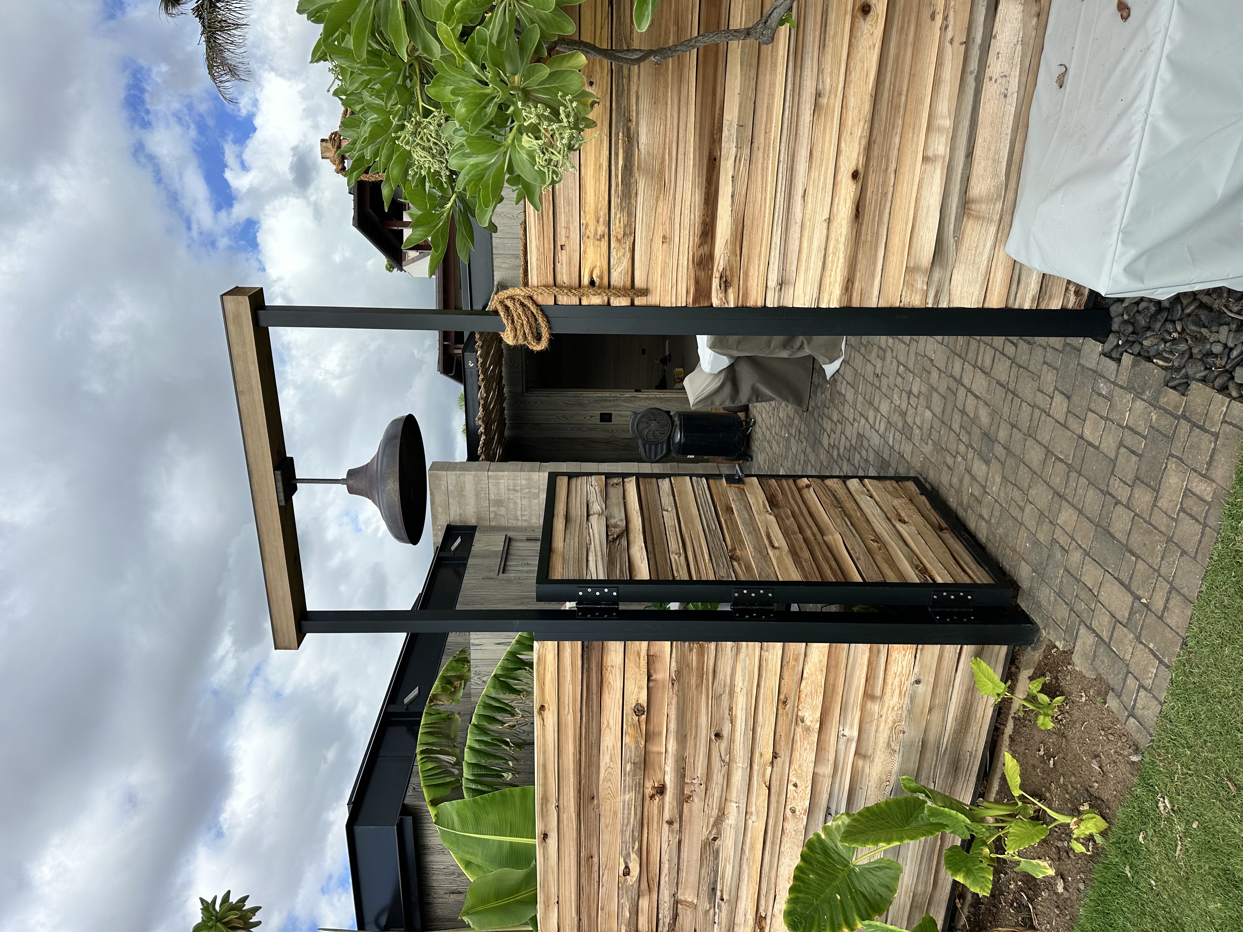 Custom metal gate with wood panels Maui by Great General LLC