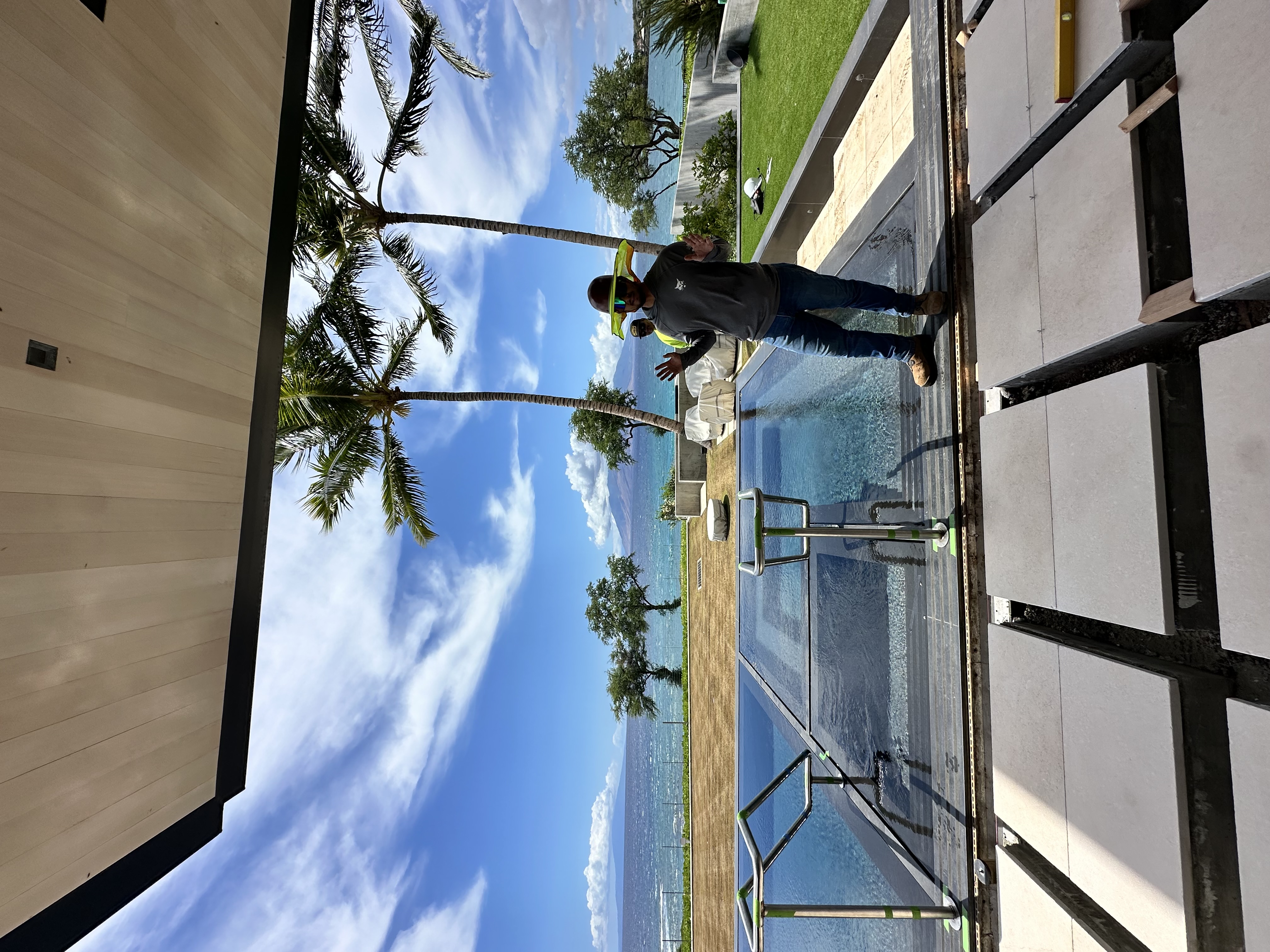 Noel, owner of Great General LLC, on site at a Wailea luxury property during railing installation