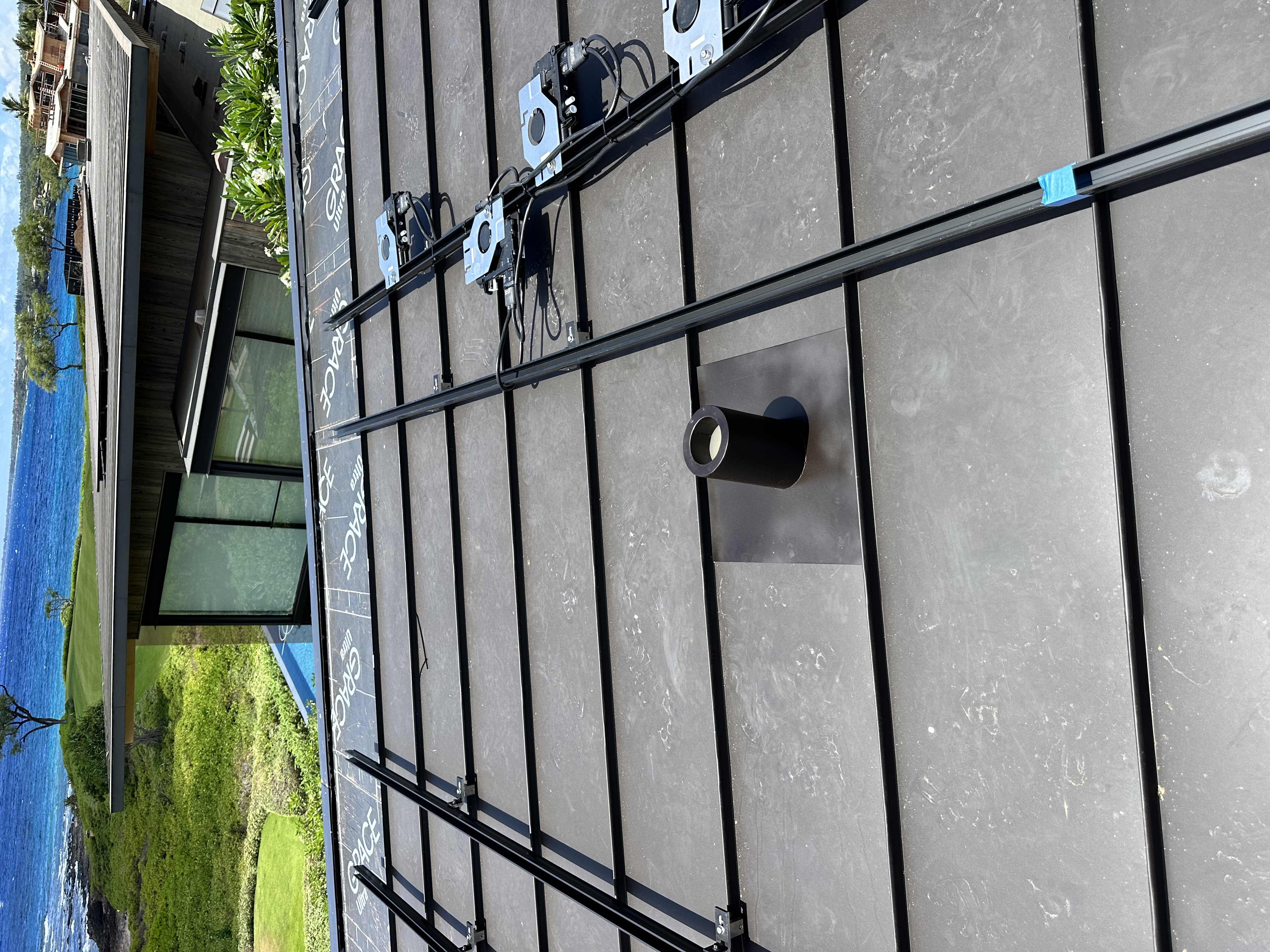 Standing seam metal roof installation Maui oceanfront property by Great General LLC